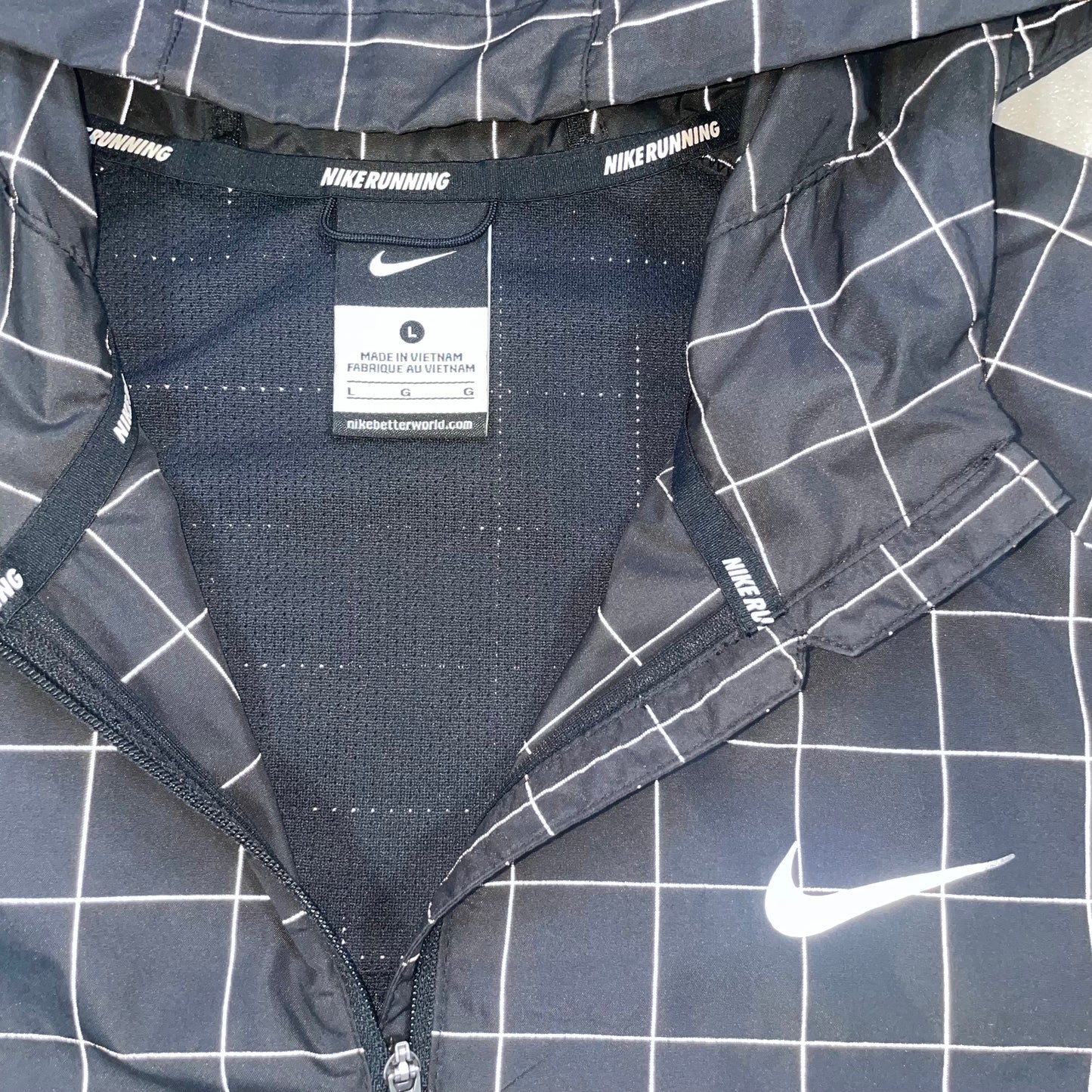 Nike “Dave Grid” 3M Reflective Windrunner (S/M)